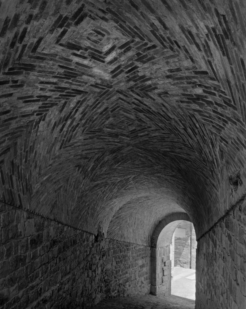 Fortezza di Radicofani - Tuscany A wide-angle lens was used here, allowing me to emphasize the difference in distance from the nearby bricks to the doorway.